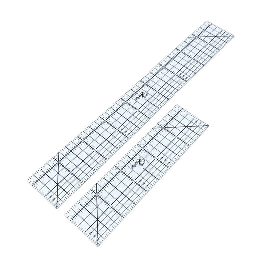 Two hot hem rulers, one 18 inches long and one 10 inches on a white background