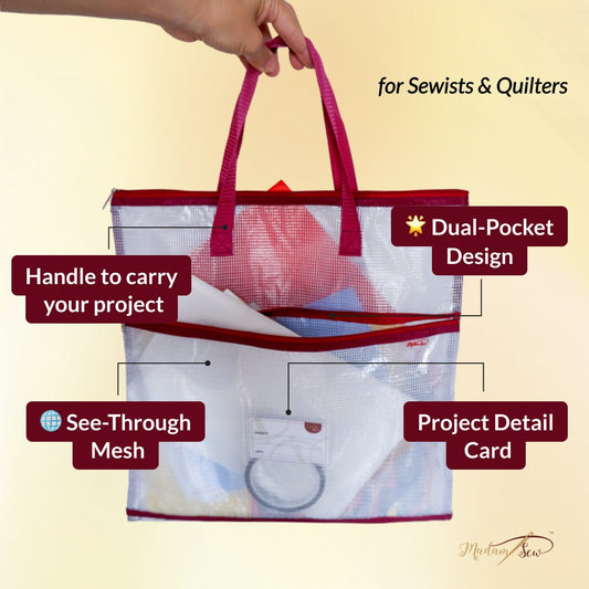 Project bag that holds patterns and tools and fabric for quilting