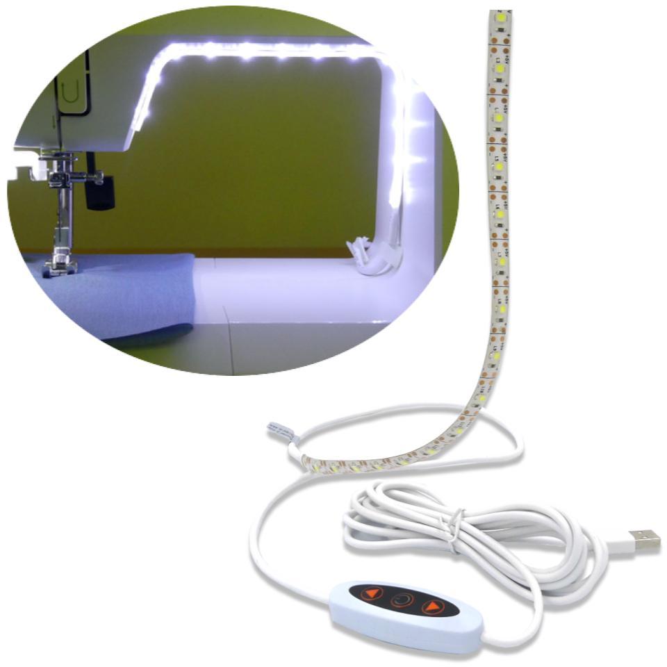 A Light Strip attached to a sewing machine plus the strip and cord and switch