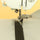 Adjustable zipper foot sewing a zipper with the needle in the notch
