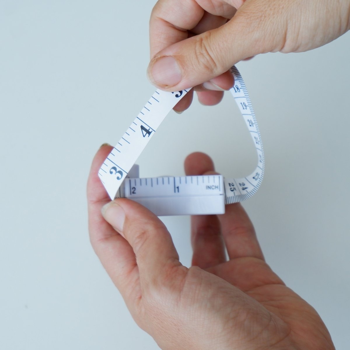 Check body measurements with measuring tape