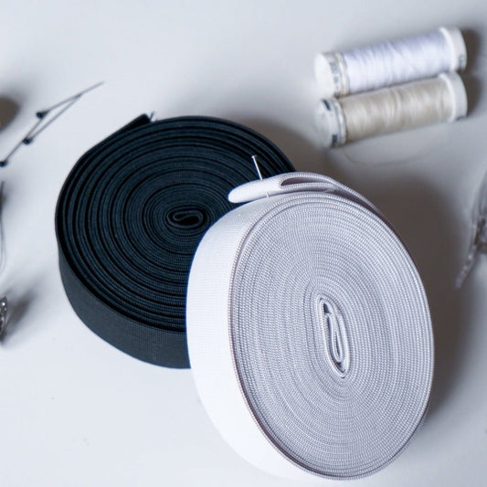 Black and White Fantastic Elastic with thread and needles ready to sew