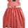 A dress custimized with flowers sewn with the Flower Stitch Presser Foot