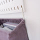 detail of the hook to attach a canvas bag to a peg board