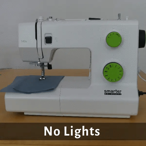 sewing machine by pfaff with a led strip attached to it