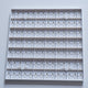 backside of a plastic Pegboard panel