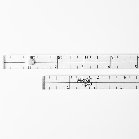 Close up of the Patchwork Rulers showing markings, center line and hole for hanging.