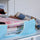 Quilt storage bag filled with quilts