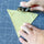 Cutting around a triangle template