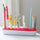 This pen holder holds sewing tools and notions to organize a sewing room