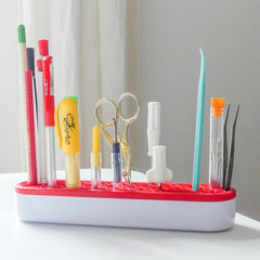 This pen holder holds sewing tools and notions to organize a sewing room
