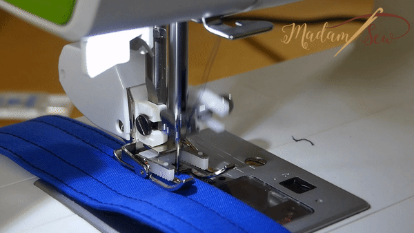 Gif showing how a walking foot moves over the fabric on a sewing machine