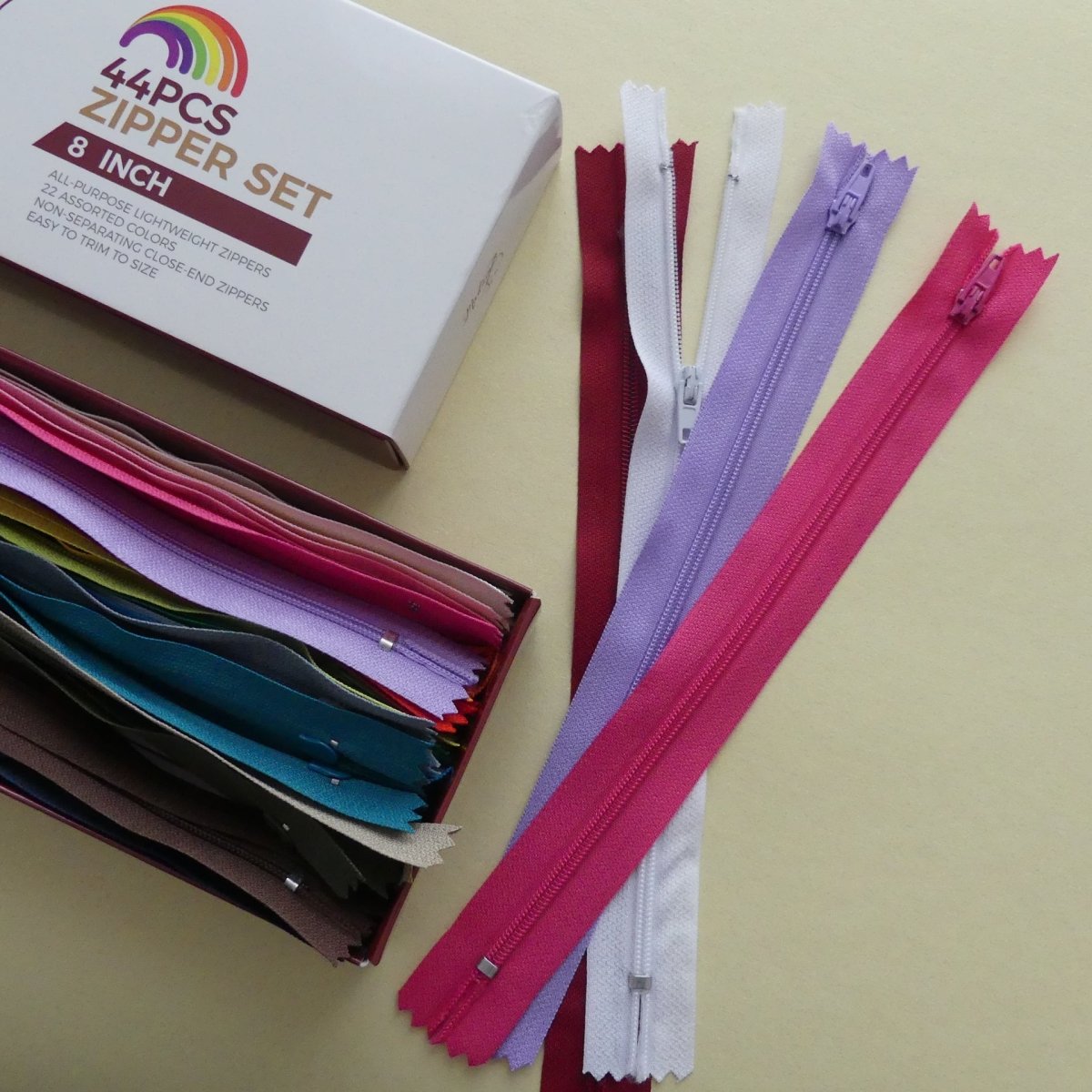 Madam Sew zippers, different colors and a box
