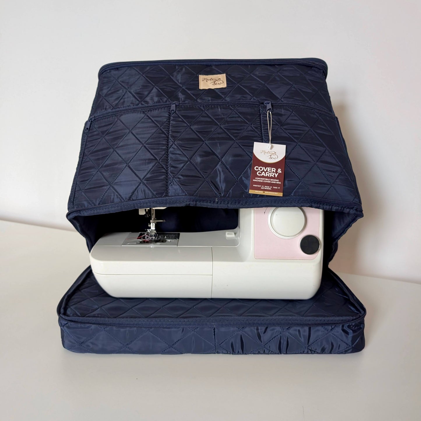 Cover & Carry convertible sewing machine bag open with sewing machine inside