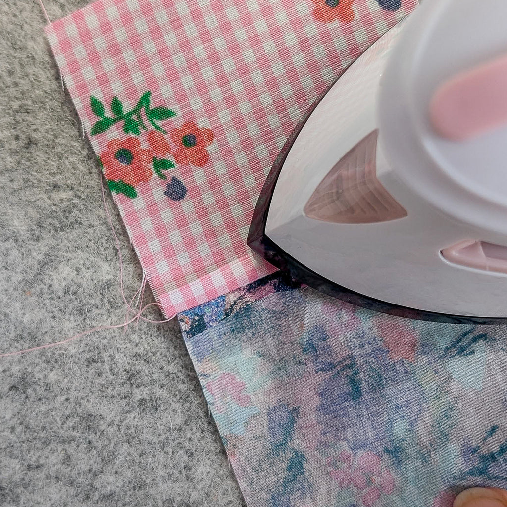 Madam Sew Mini Iron pressing a seam.