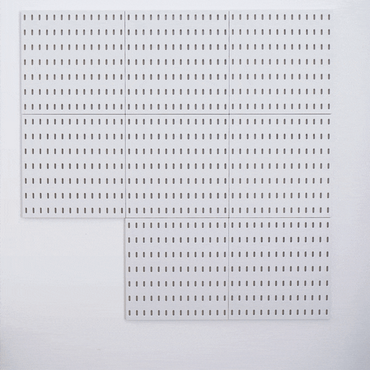 Gif showing a pegboard being used to hang sewing tools