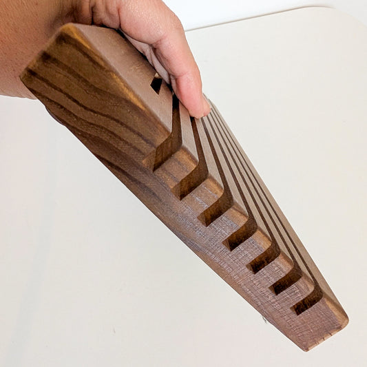 Side view of the Quilting Ruler Holder showing the slots for rulers.