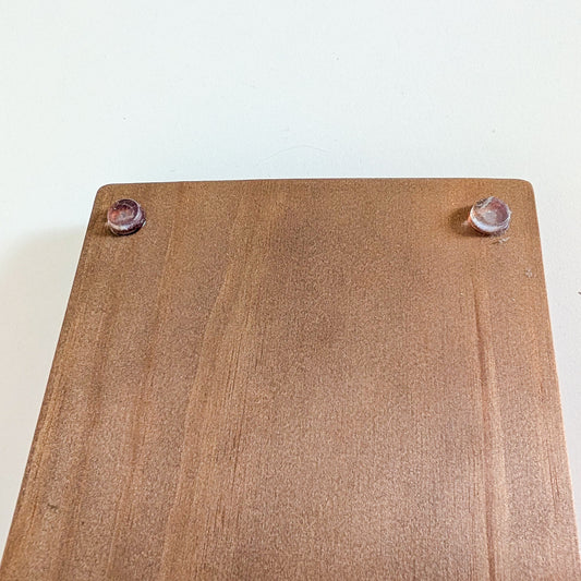 Picture of the anit-slip feet on the bottom of the Madam Sew Quilting Ruler Holder.