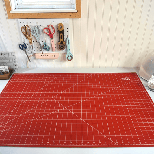 Madam Sew Self Healing Cutting Mat unfolded on sewing table