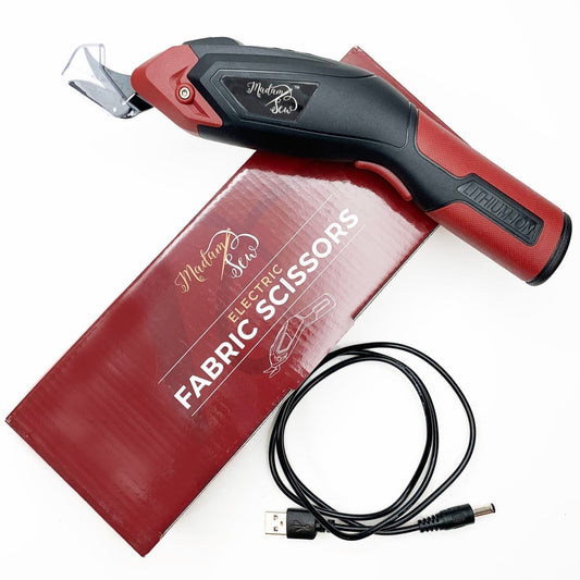 Cordless Electric Fabric Scissors with box and charge cable by Madam Sew