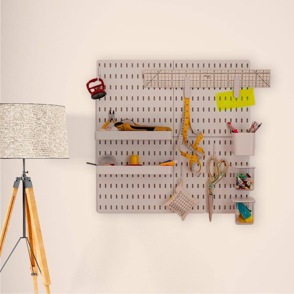 Peg Board on the wall with craft tools