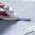 ironing a double folded hem with a hot hem ruler