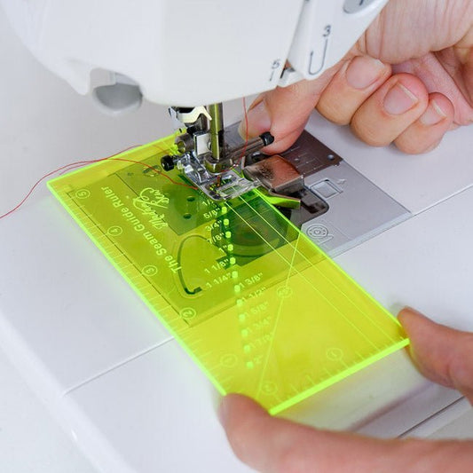 Seam Guide Ruler with a Magnetic Seam Guide on a sewing machine to set your stitch accurately