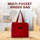 The Madam Sew multi-pocket binder bag on a wooden table