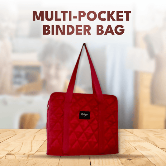The Madam Sew multi-pocket binder bag on a wooden table