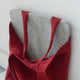 A wool pressing mat in a tote bag
