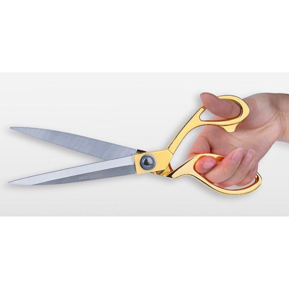 9.5" Gold Handled Stainless Steel Shears being held.