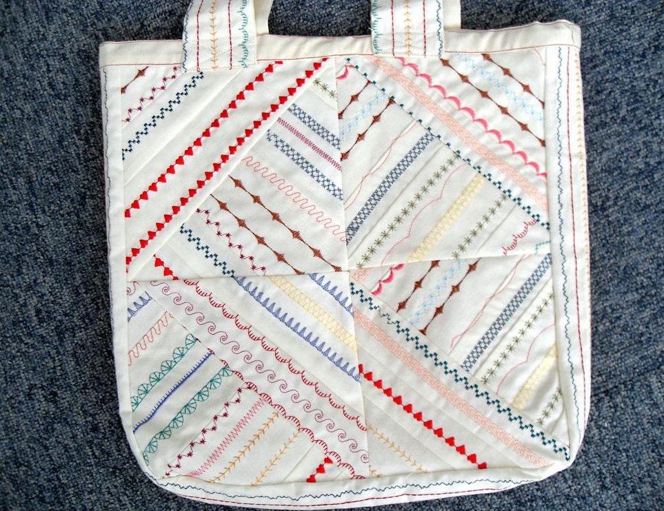 A tote bag that has been embellished using the Border Guide Presser Foot.