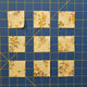 Fabric squares cut with the Creative Shape Cut Ruler