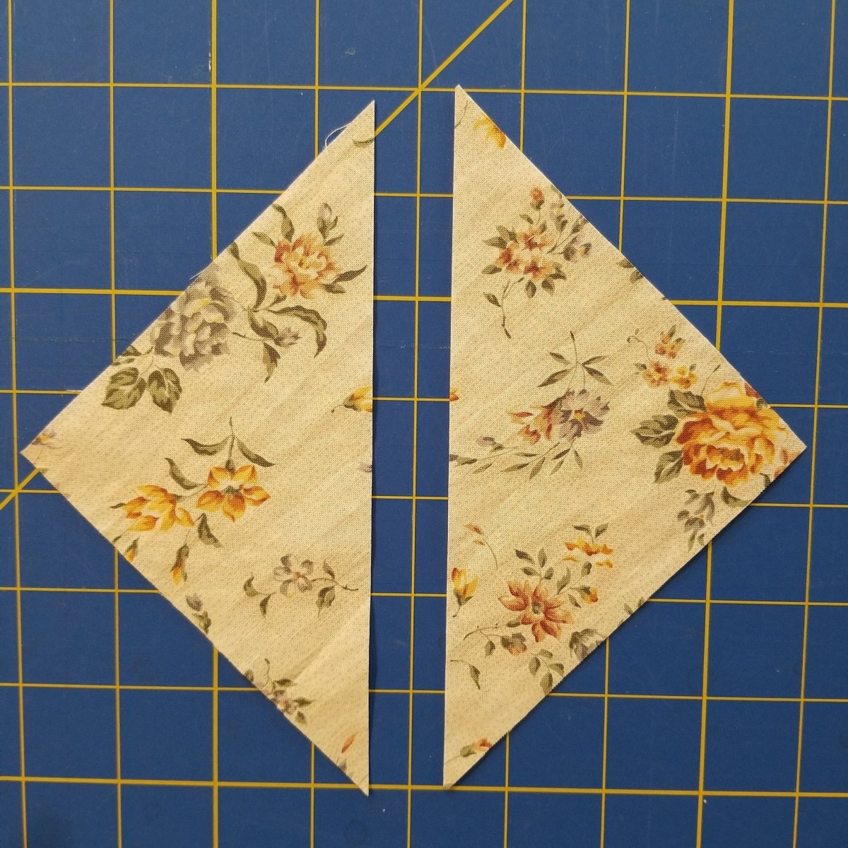 Triangles cut in fabric with the Creative Shape Cut Ruler