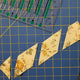 Hexagon shaped fabric cut with the Creative Shape Cut Ruler