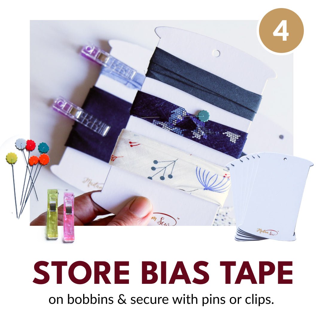 Using Bias Tape Bobbins to store bias tape and pins or clips to hold it on them.