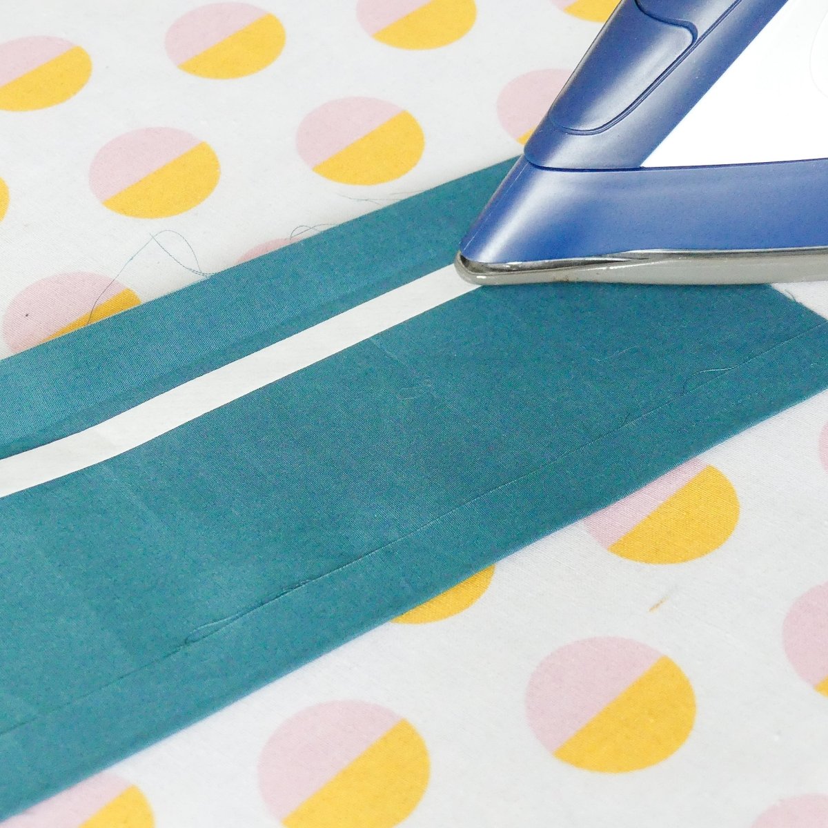Iron the Fusible Hem Tape to your fabric