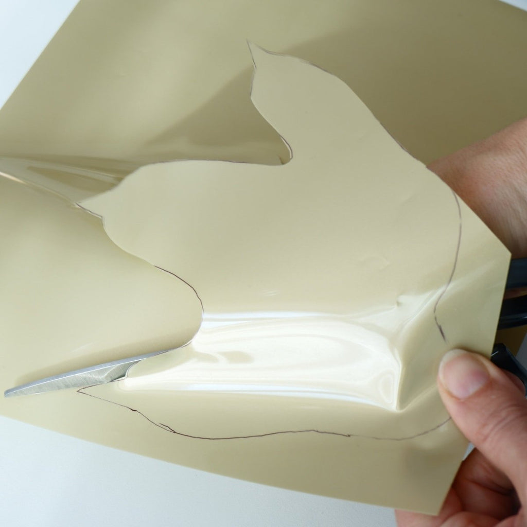A partially cut shape using Heat Transfer Vinyl