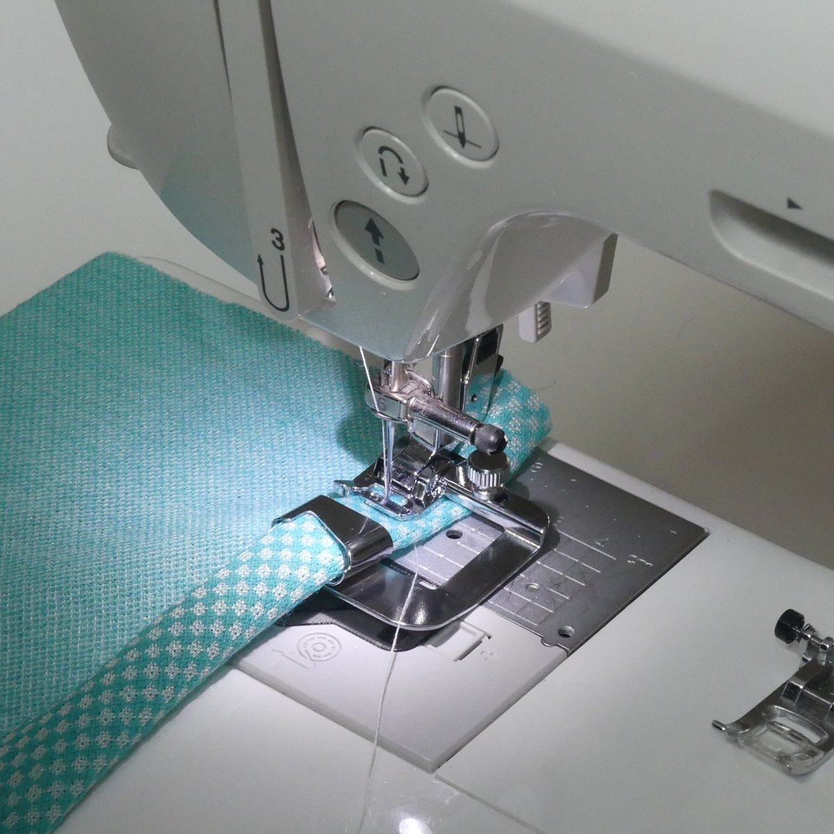 Hemming foot on a sewing machine