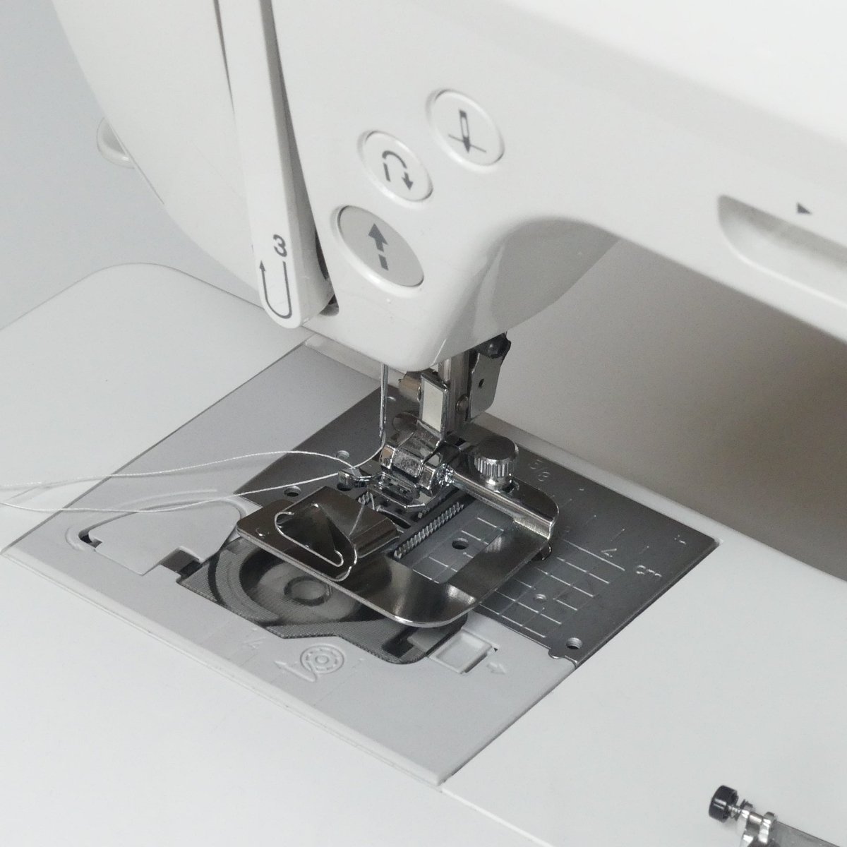 Hemming presser foot on a sewing machine