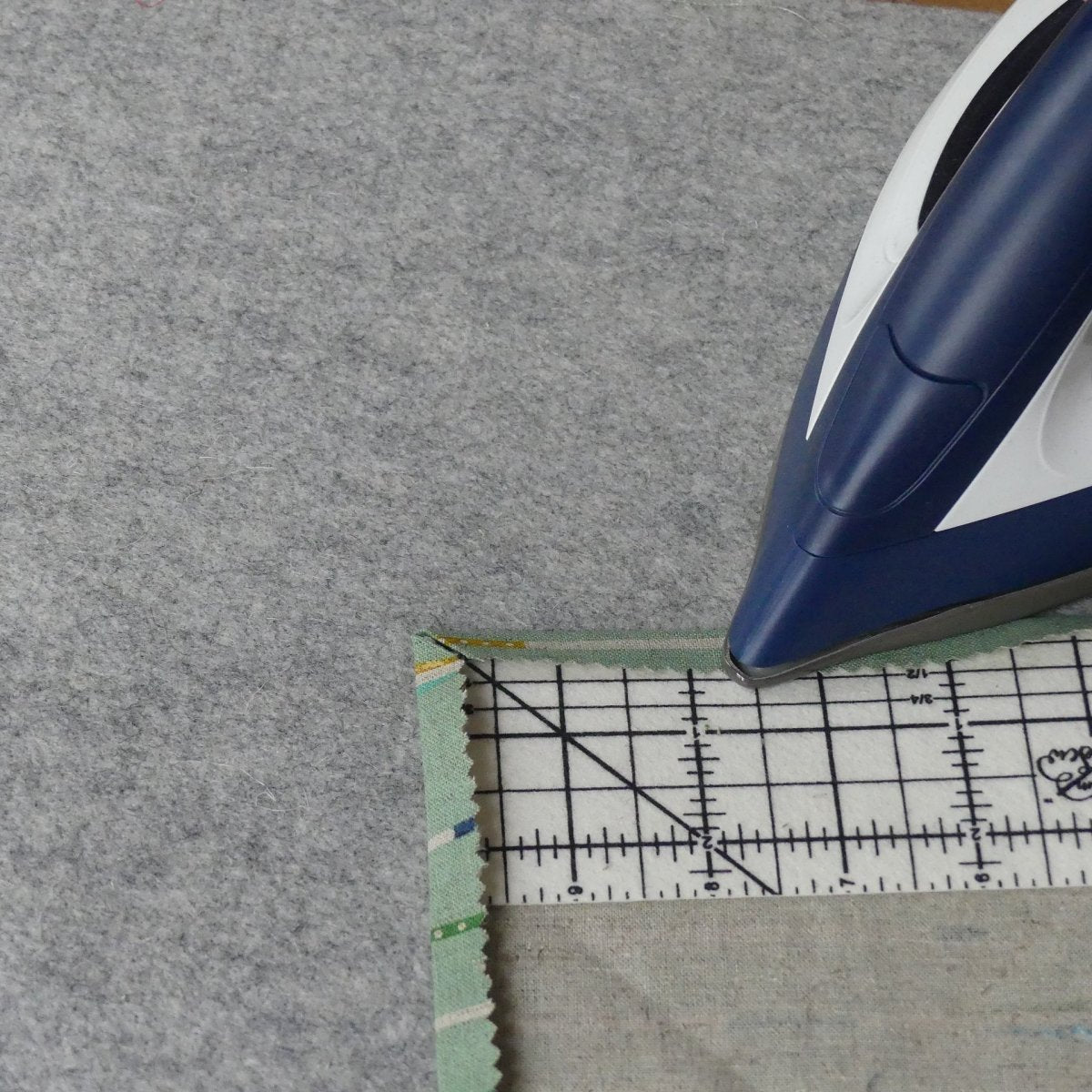 Ironing mitered corners with the Hot Hem Ruler