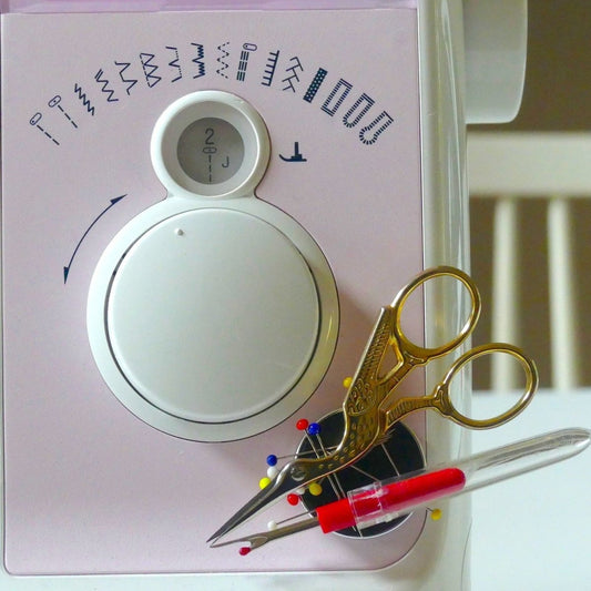 Magic Holder holding pins, small scissors and seam ripper