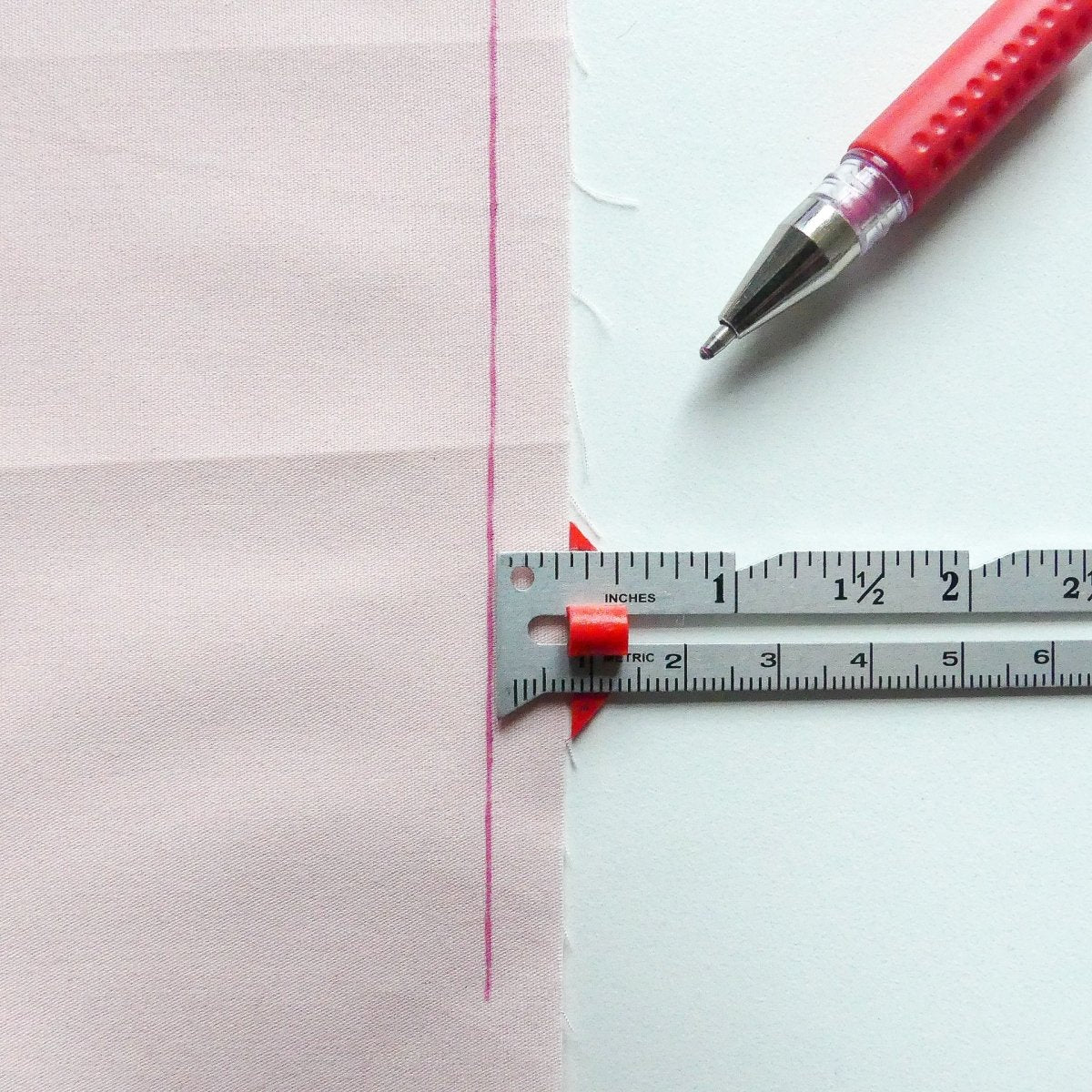 marking fabric with a temporary fabric marker and a seam gauge for sewing