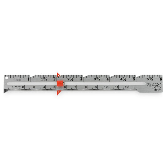 Seam gauge for sewing and quilting on a white background