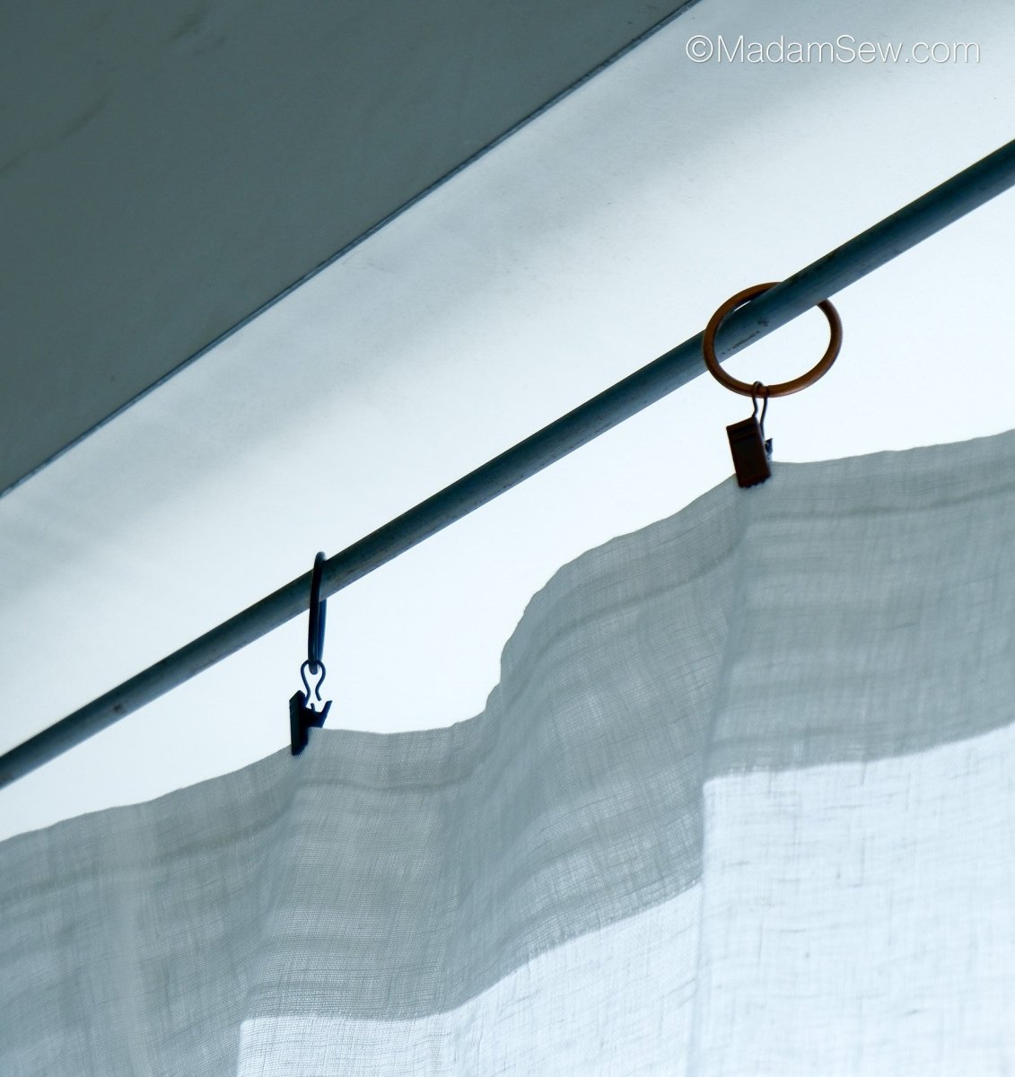 Metal Curtain & Quilt Hangers for a white lightweight curtain