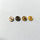 4 different colors of metal snap buttons