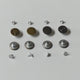 different parts of the metal snap button set in a row