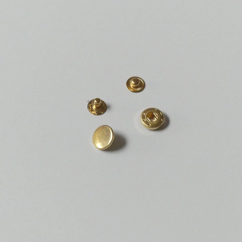 different parts of a metal snap button