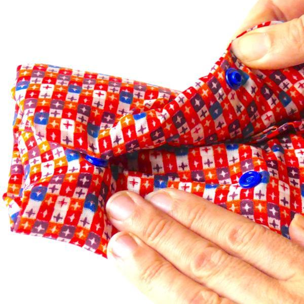 Plastic Snap Buttons attached to both sides of a project.