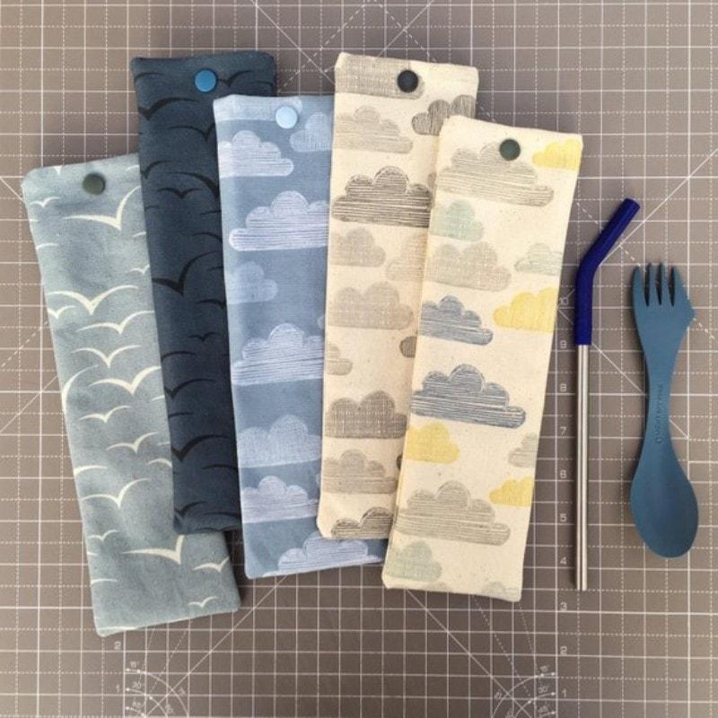 Plastic Snap Buttons on a straw and utensil holder.